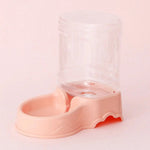 distributeur-de-croquettes-pour-chat-eau-rose